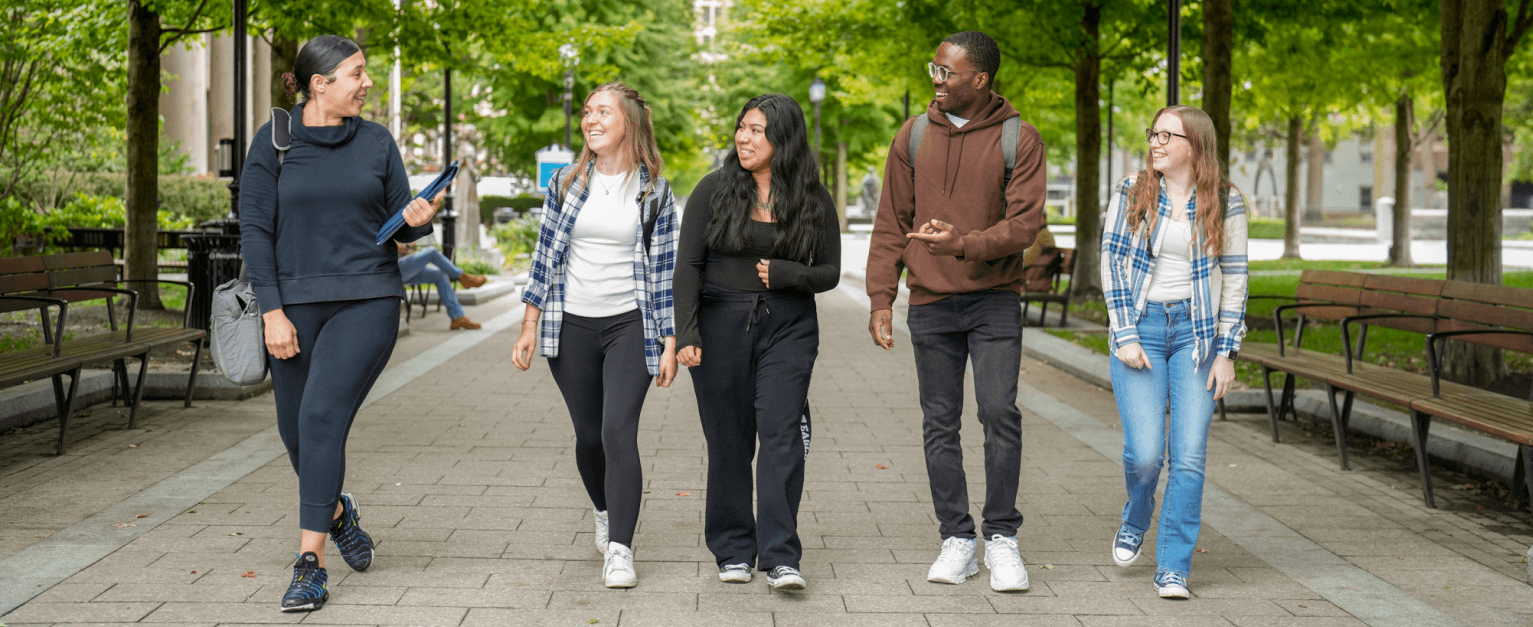 Students walking through Hancock Adams Common