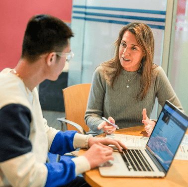 Two people are discussing business.