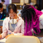 two Early College High School Pathway students smiling